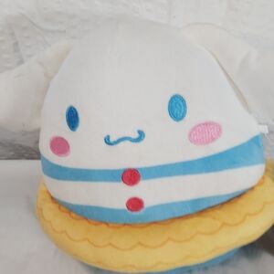 Plush Toy with Blue and Pink Accents